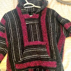 Oversized pink, black, and white polyester/acrylic hoodie